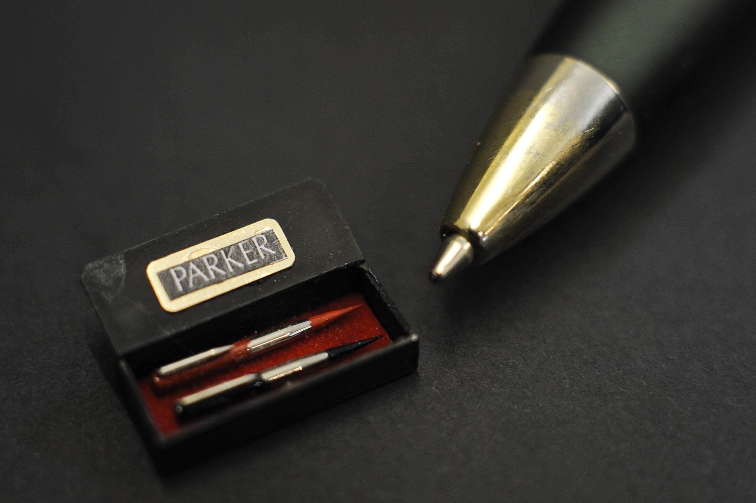 A box of 2 Parker pens, costing £9, made by Klaas Schultz of South Africa are dwarfed by the nib of a ball-point pen. PRESS ASSOCIATION Photo. Picture date: Thursday September, 29, 2011. Karon Cunningham Miniatures shop in Bath, UK, offers a wide and varied collection of miniature furniture, accessories and figurines made by some of the worlds leading miniature makers. Photo credit should read: Ben Birchall/PA Wire